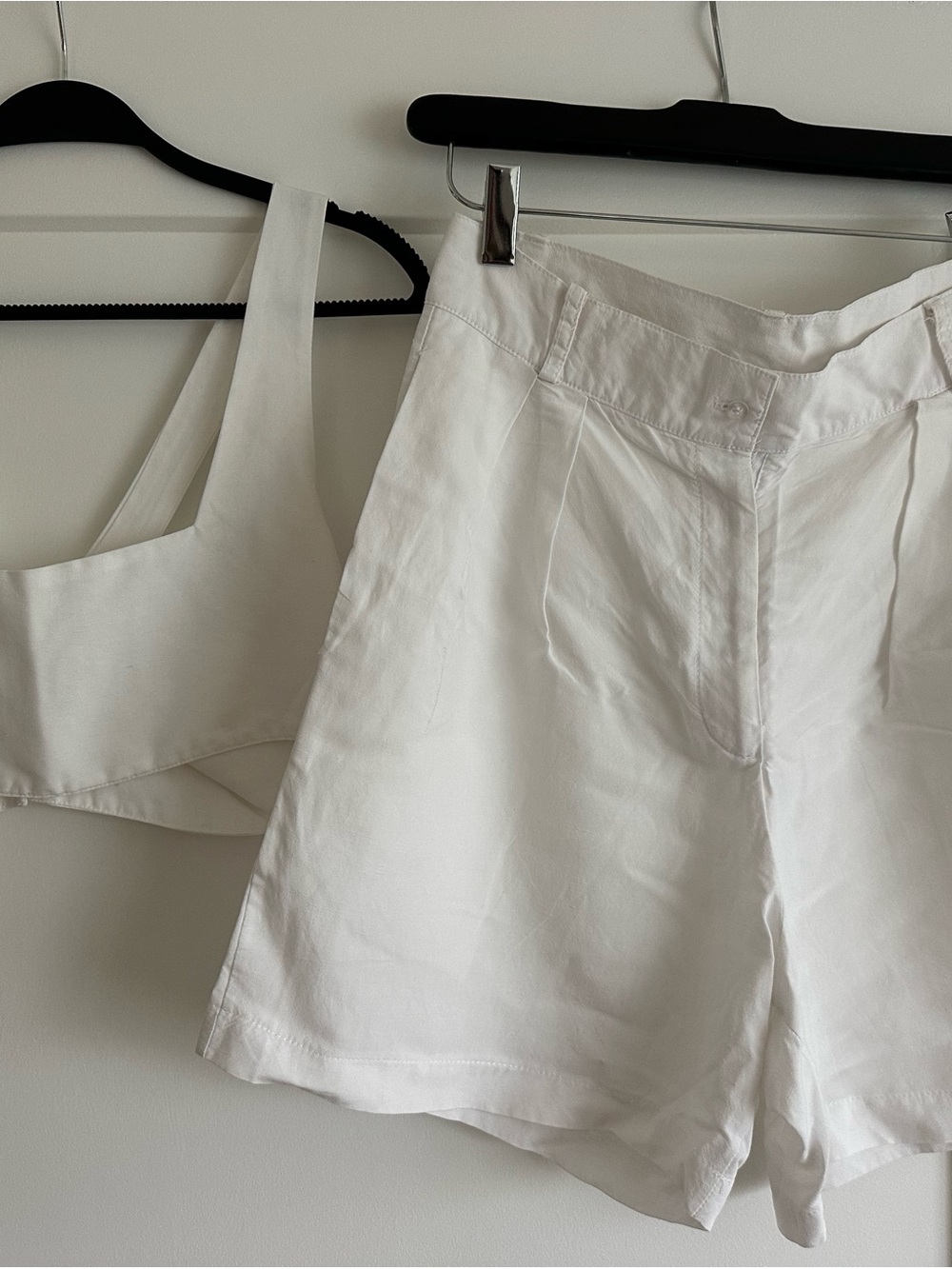 White Women's Bermuda Shorts and top.